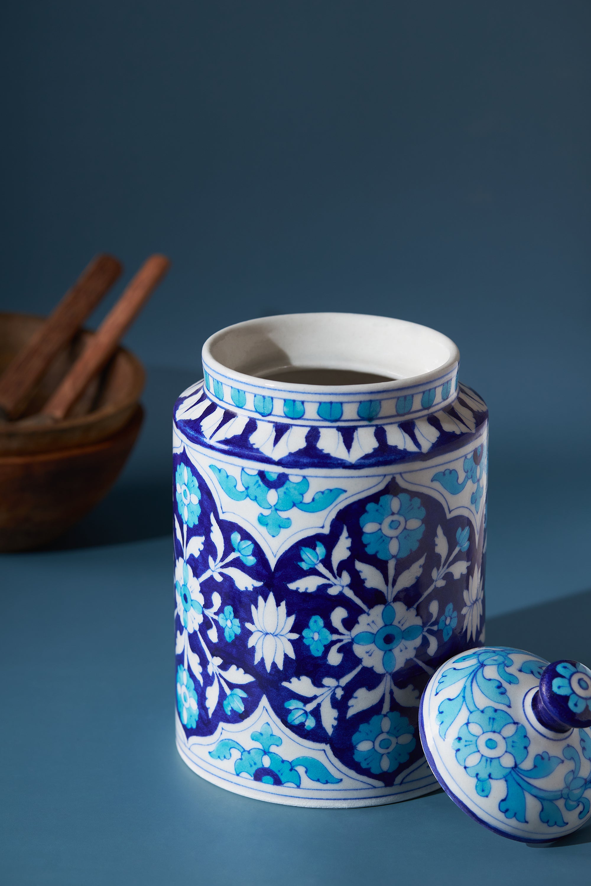 Traditional Blue Pottery Canister – Decorative Kitchen Jar
A stunning ceramic storage jar with a lid, featuring hand-painted floral motifs in deep blue and turquoise hues