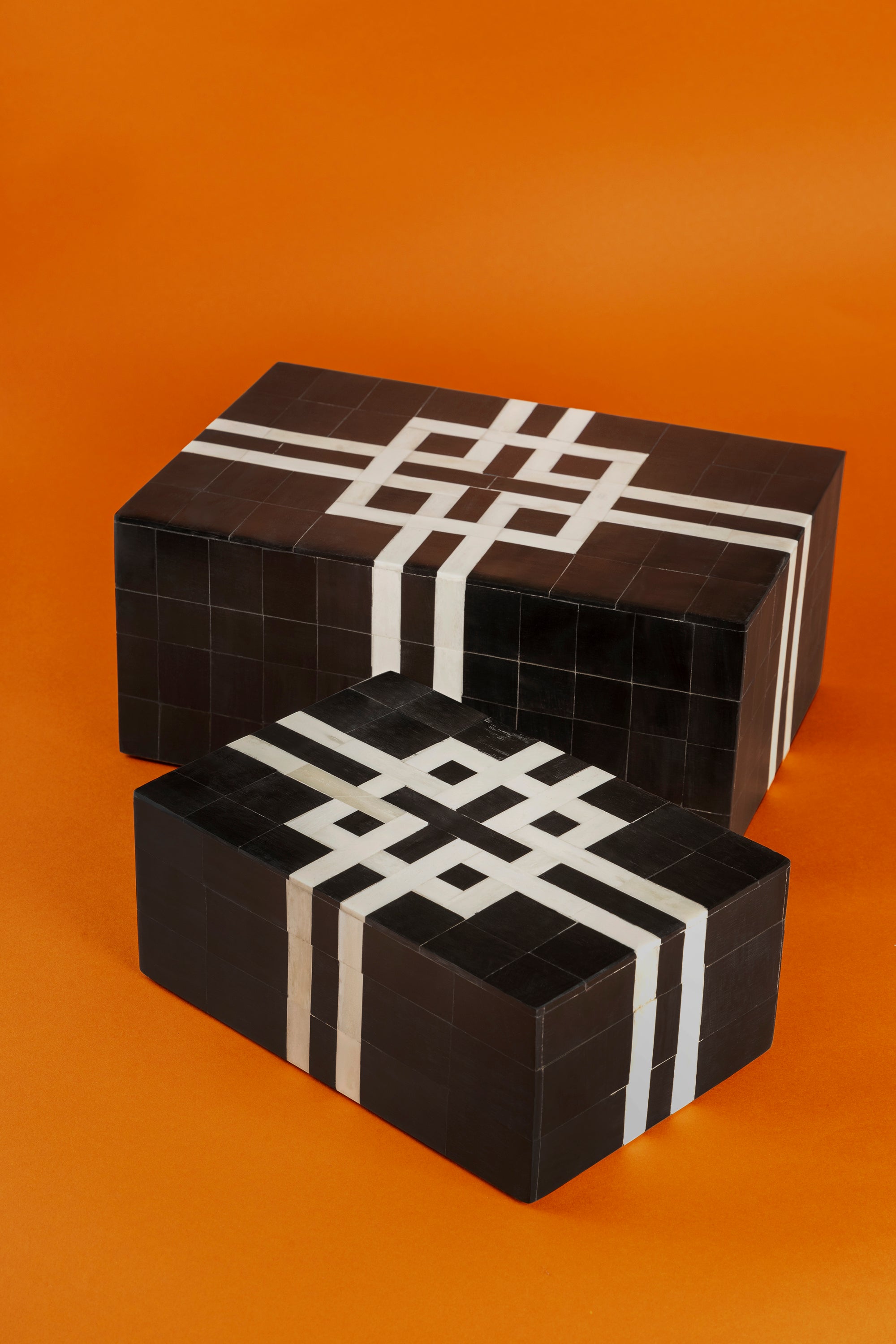 Handcrafted horn and bone inlay decorative boxes in black and ivory tones — artisan luxury accent
