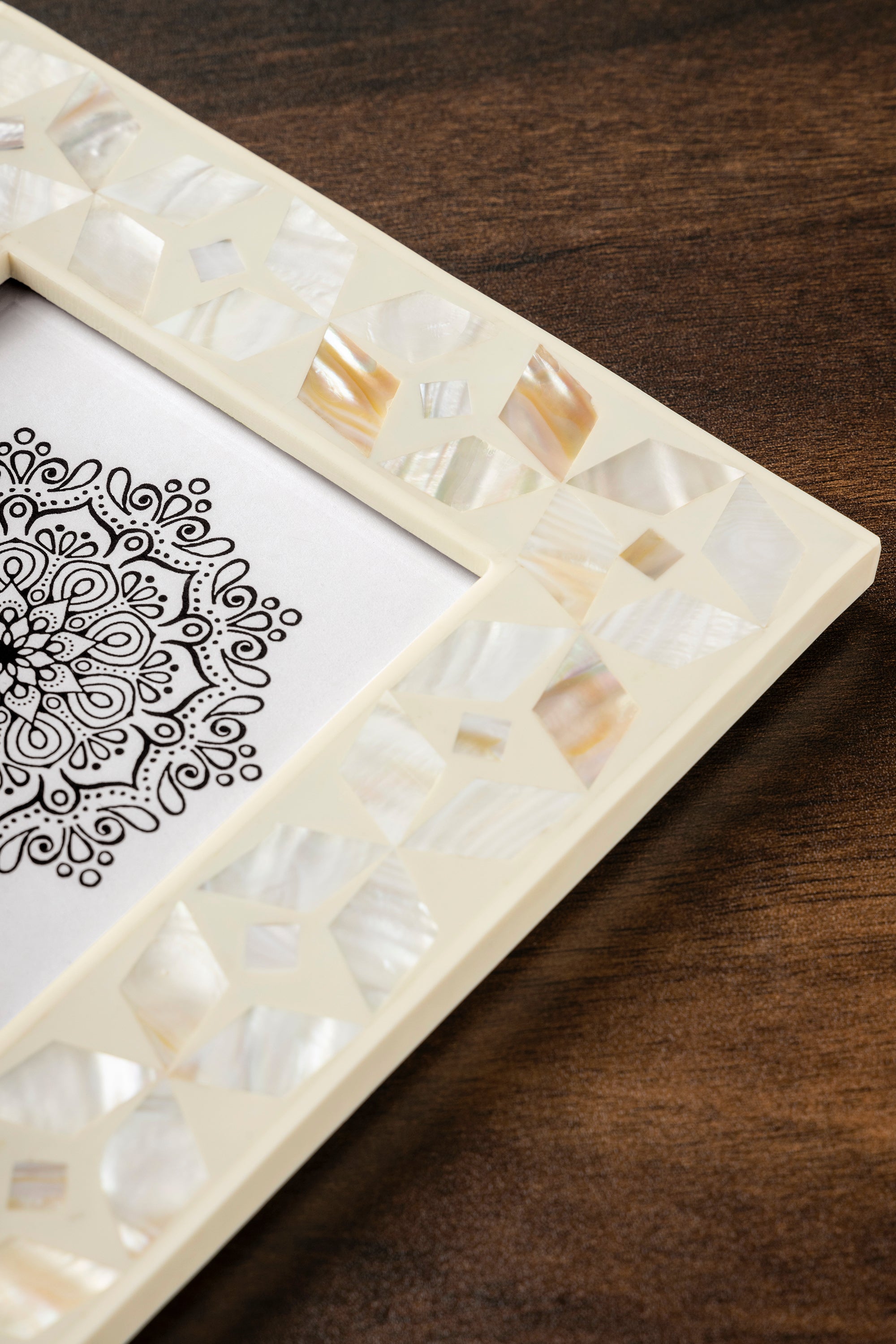 Artisan-made mother-of-pearl picture frame in ivory finish — luxury home accessory