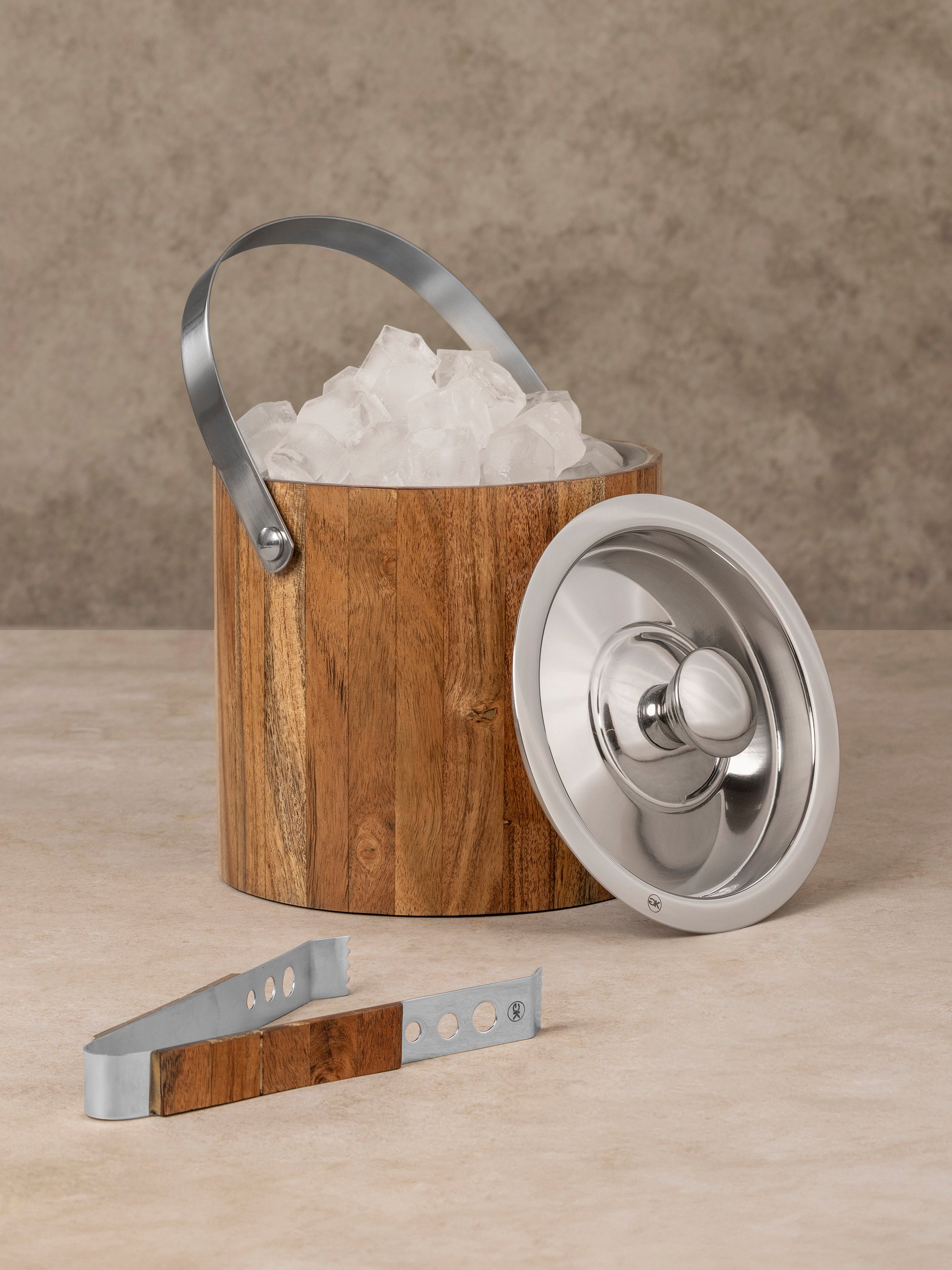 Chicago ice bucket with wood exterior and stainless steel liner shown from above, revealing interior capacity and material contrast