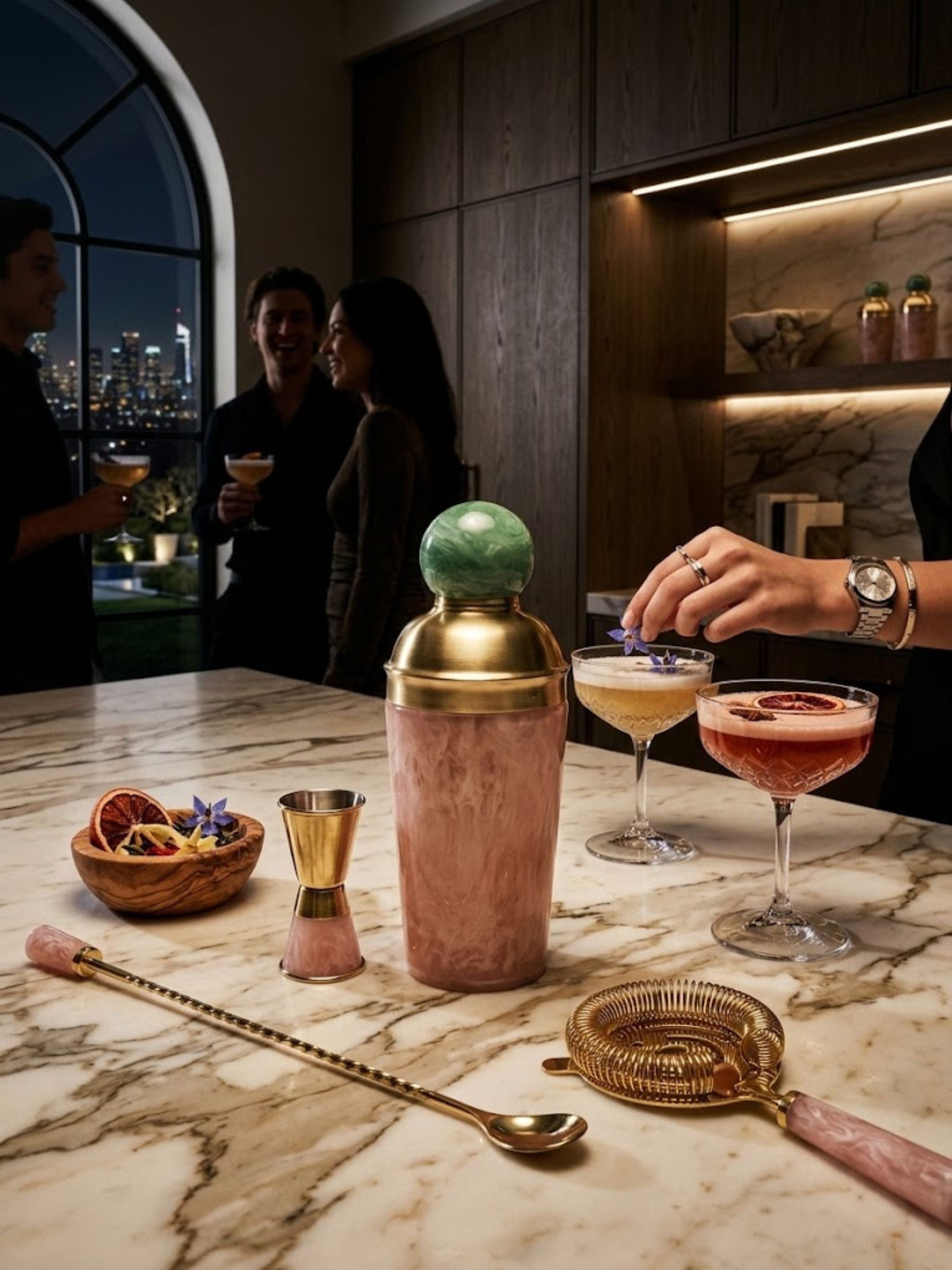 Copenhagen marbled resin cocktail shaker featured in an evening entertaining setting, adding sculptural presence and refined craftsmanship to home bar rituals.