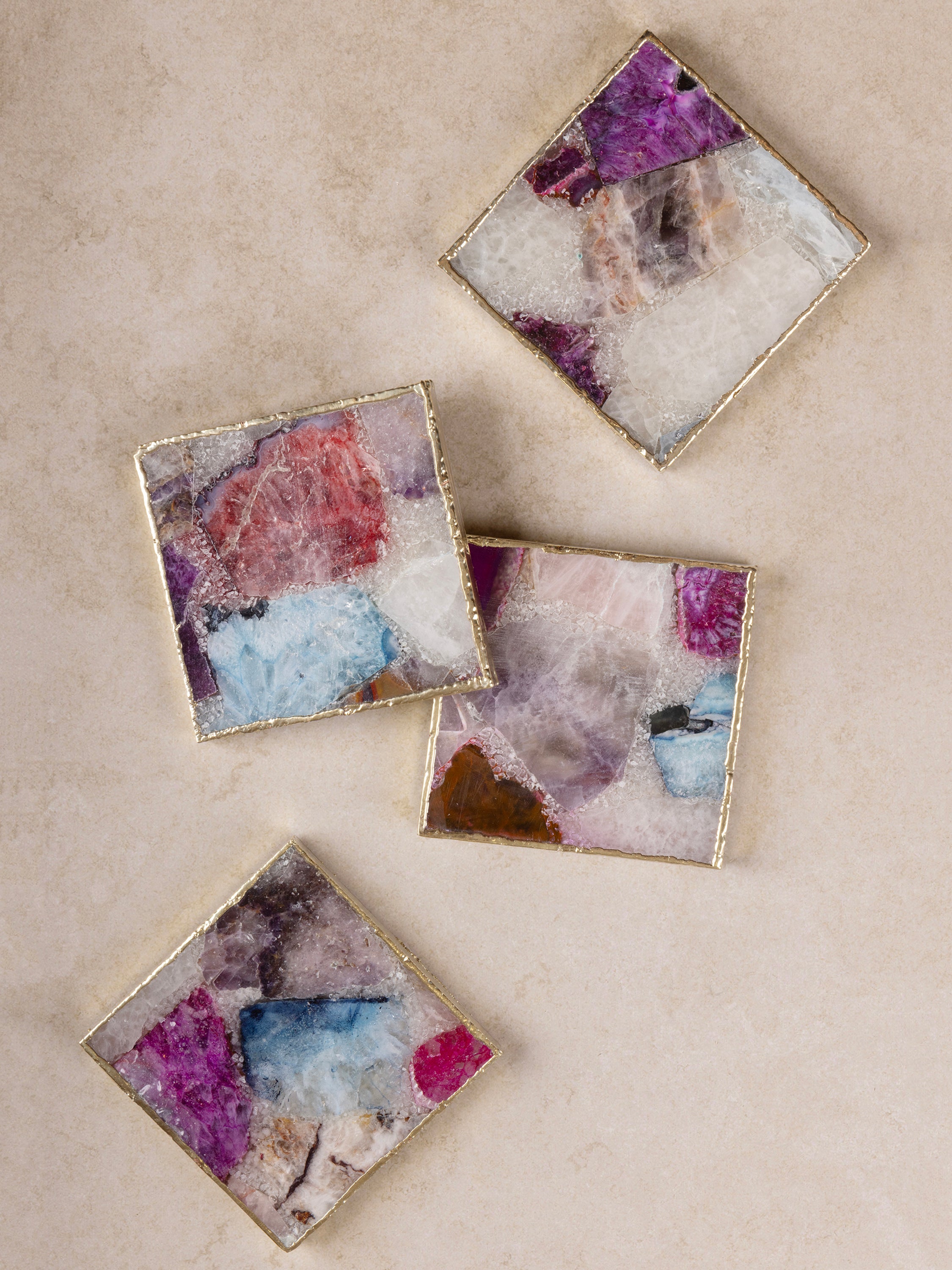 Luxury Multicolored Gemstone Coasters – Set of 4 with Gold Edges
A stunning set of handcrafted gemstone coasters featuring vibrant multicolored crystals with elegant gold trim