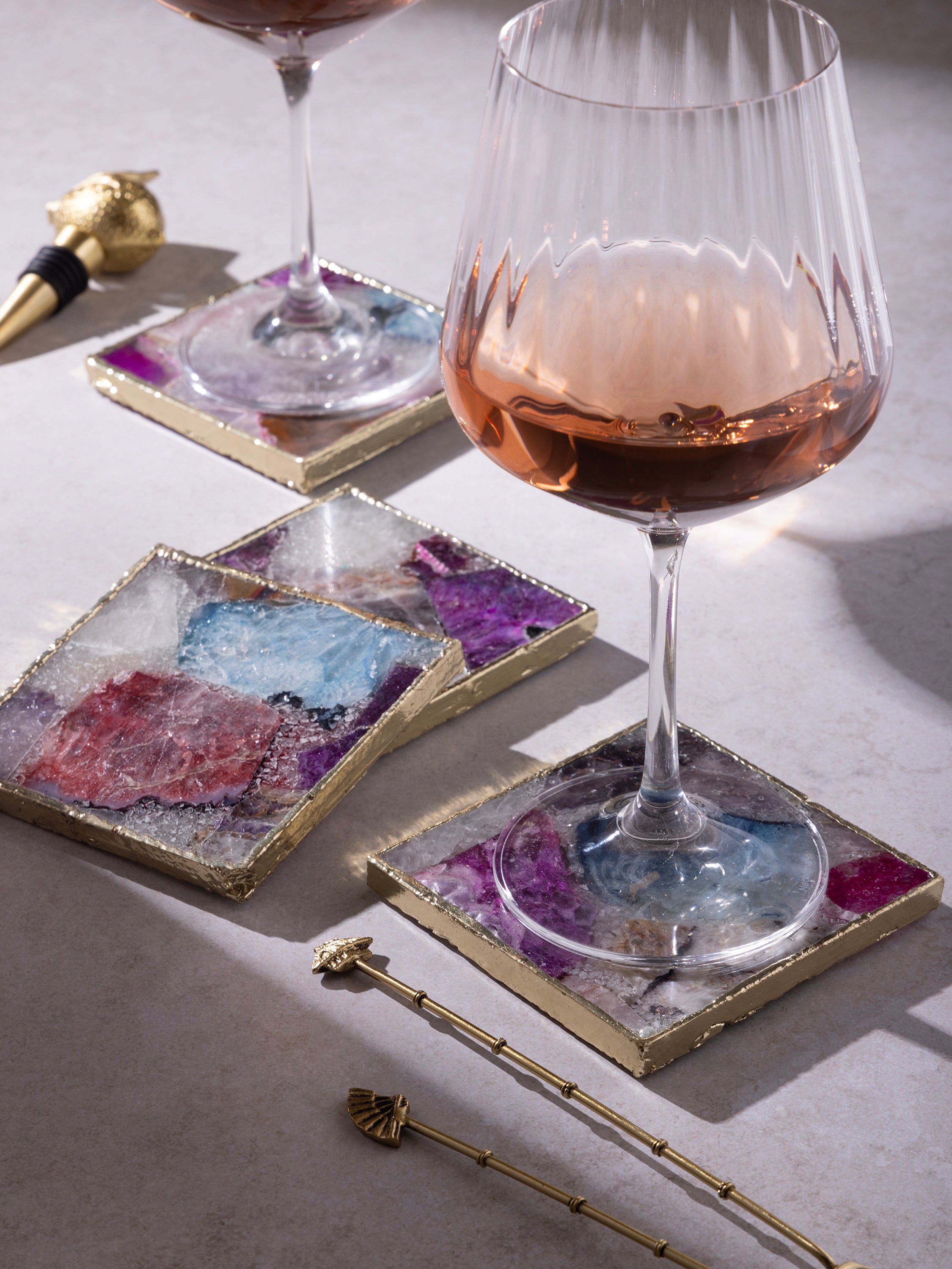 Handmade Crystal Coasters – Unique Agate & Quartz Stone Drink Coasters
A beautiful set of natural gemstone coasters, showcasing colorful crystal formations framed with a gold-plated edge