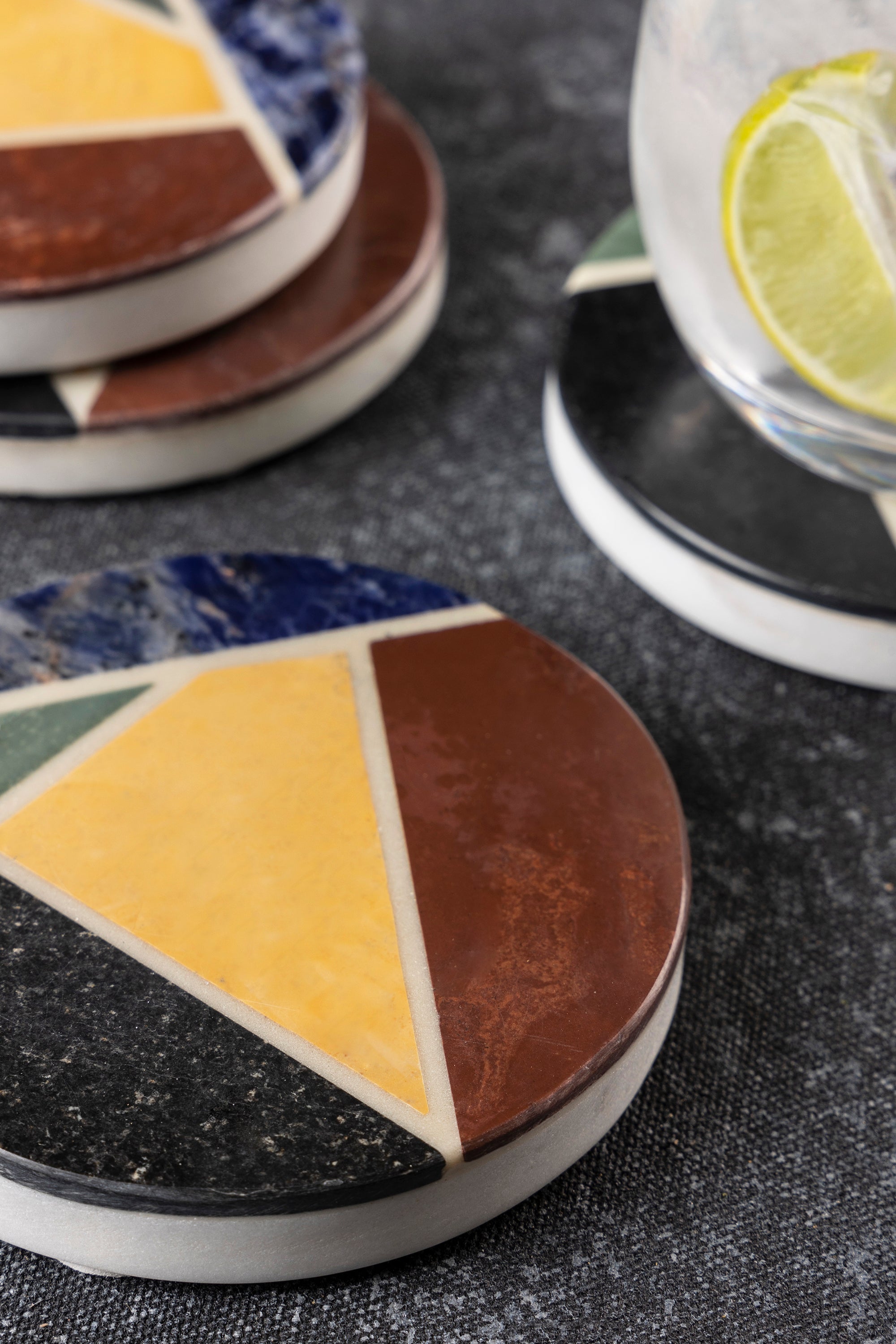Geometric Inlay Marble Coasters – Handmade Set of 4
A beautifully handcrafted set of round marble coasters with bold geometric patterns made from premium semi-precious stones, perfect for drinks and décor