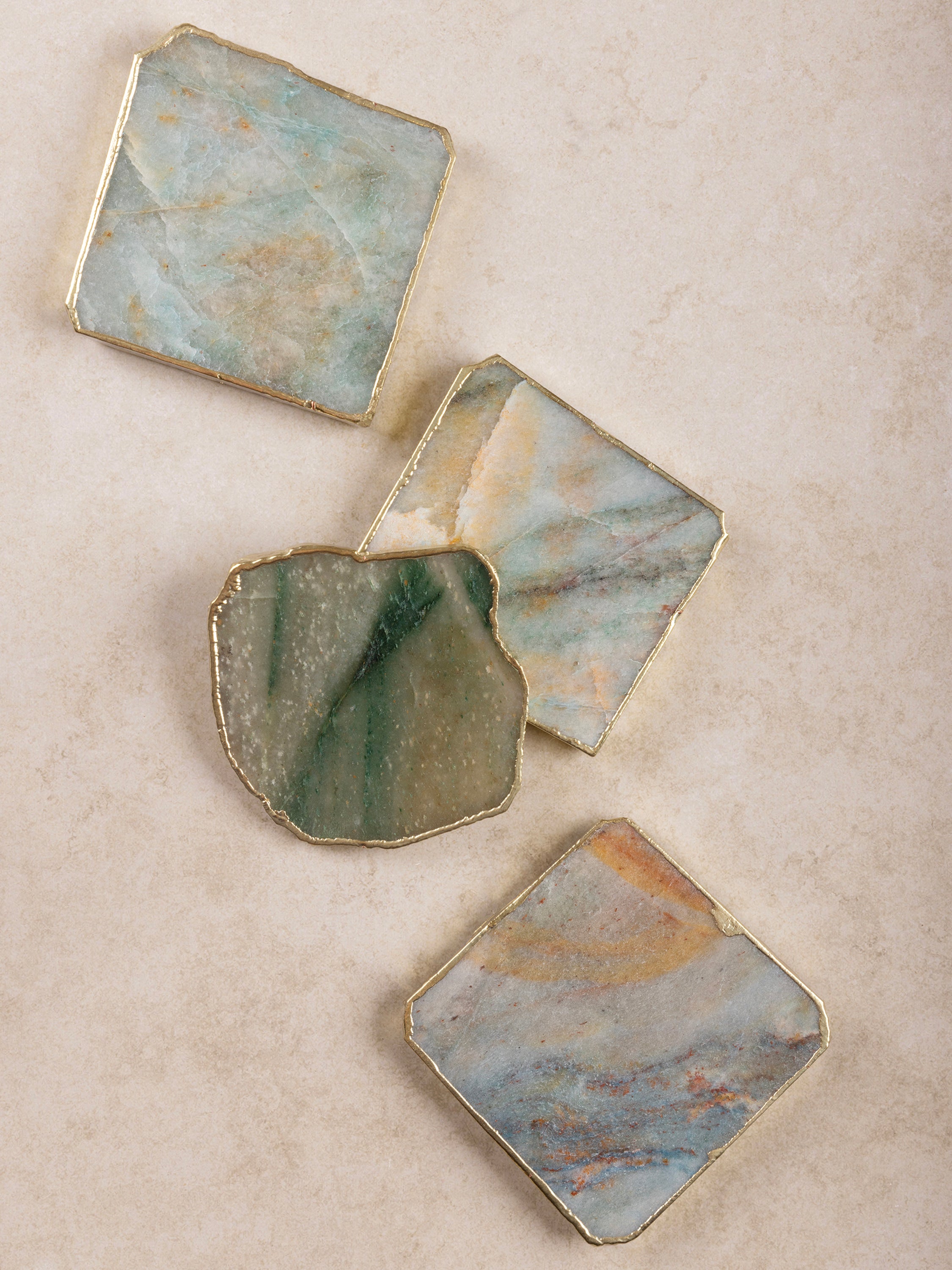 Luxurious green aventurine stone coasters with gold edges – perfect for stylish home decor