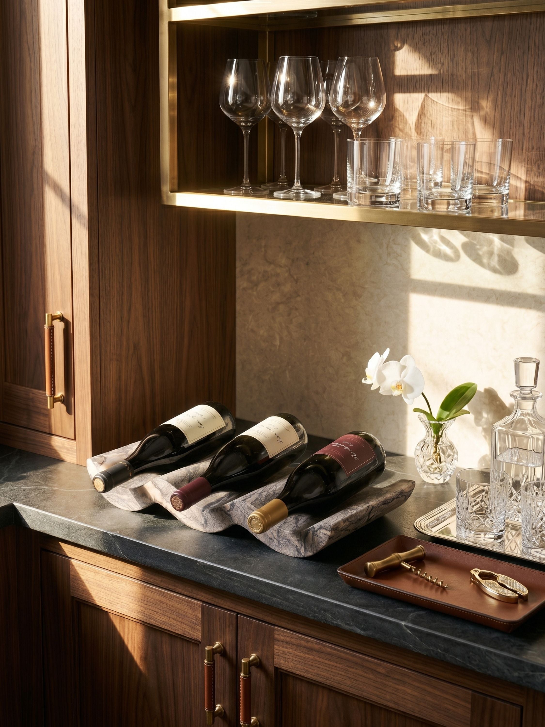 Georgia brown onyx wine bottle holder arranged within a refined home bar setting, paired with crystal glassware and warm walnut cabinetry.