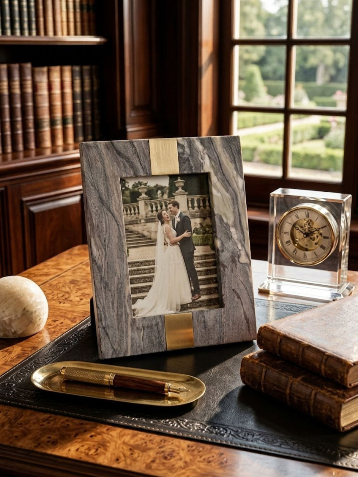 Mocha brown onyx picture frame with an unbroken matte surface, styled on a home office desk.