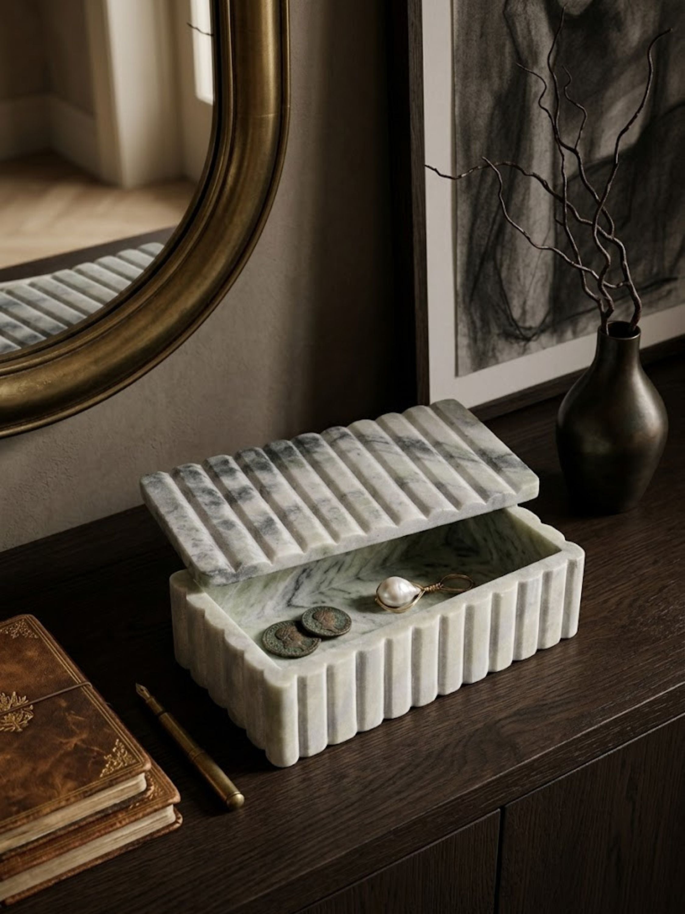 Cuba ribbed green onyx box displayed on a console shelf, showing its layered mineral veining and carved detailing.