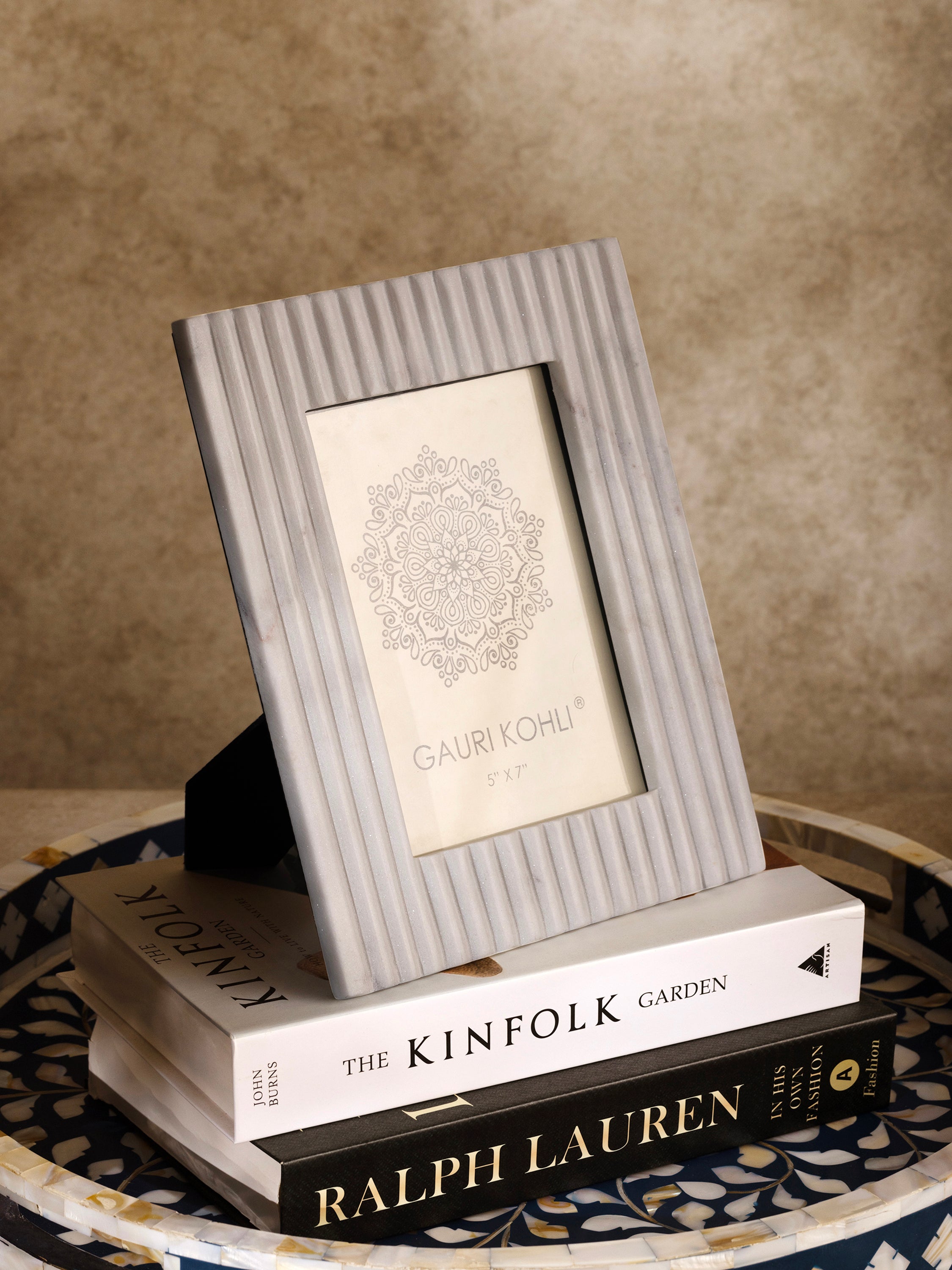 Chic white marble photo frame with sleek design and subtle veining, ideal for modern home decor