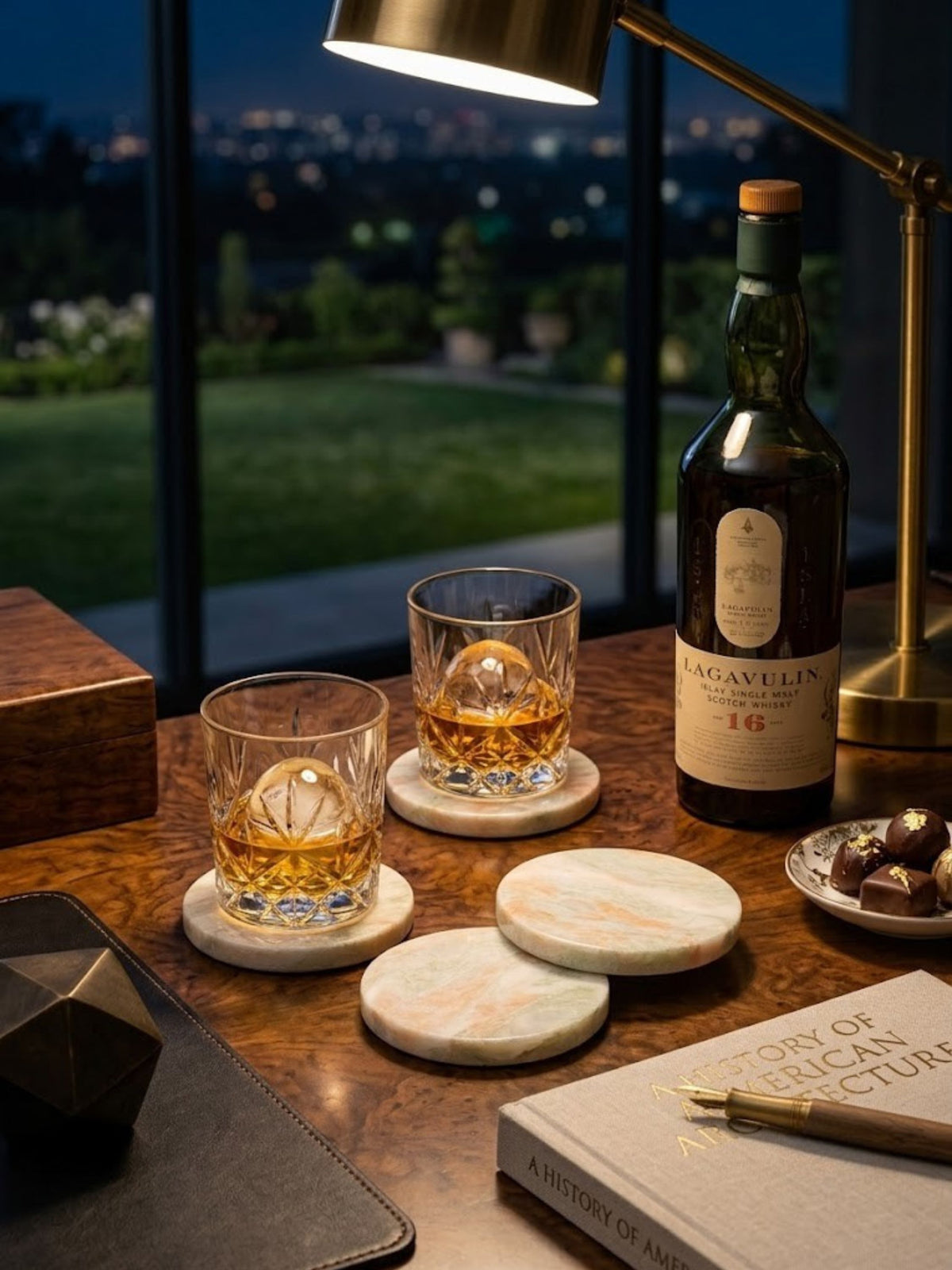 Onyx coaster set of four styled in a dimly lit interior, blush-toned veining across the stone.