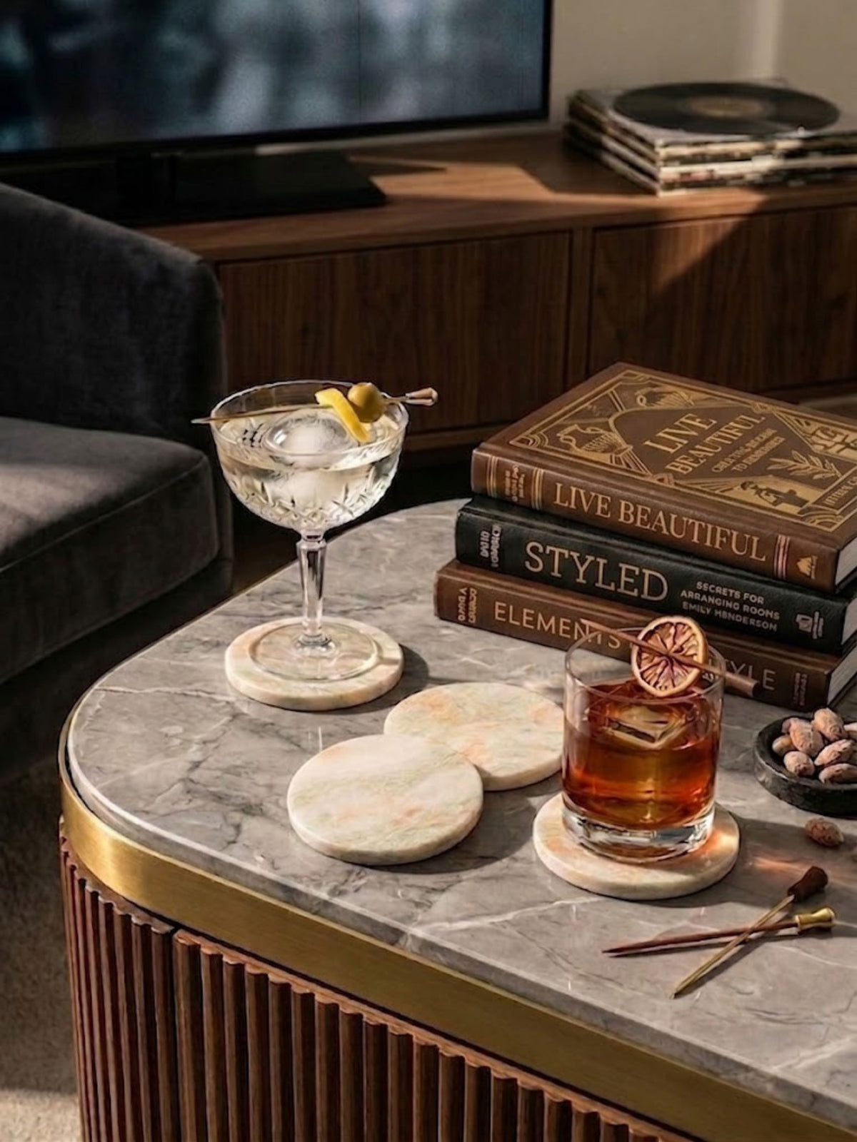 Onyx coaster set of four styled in a living room setting, rounded edges and subtle stone variation.