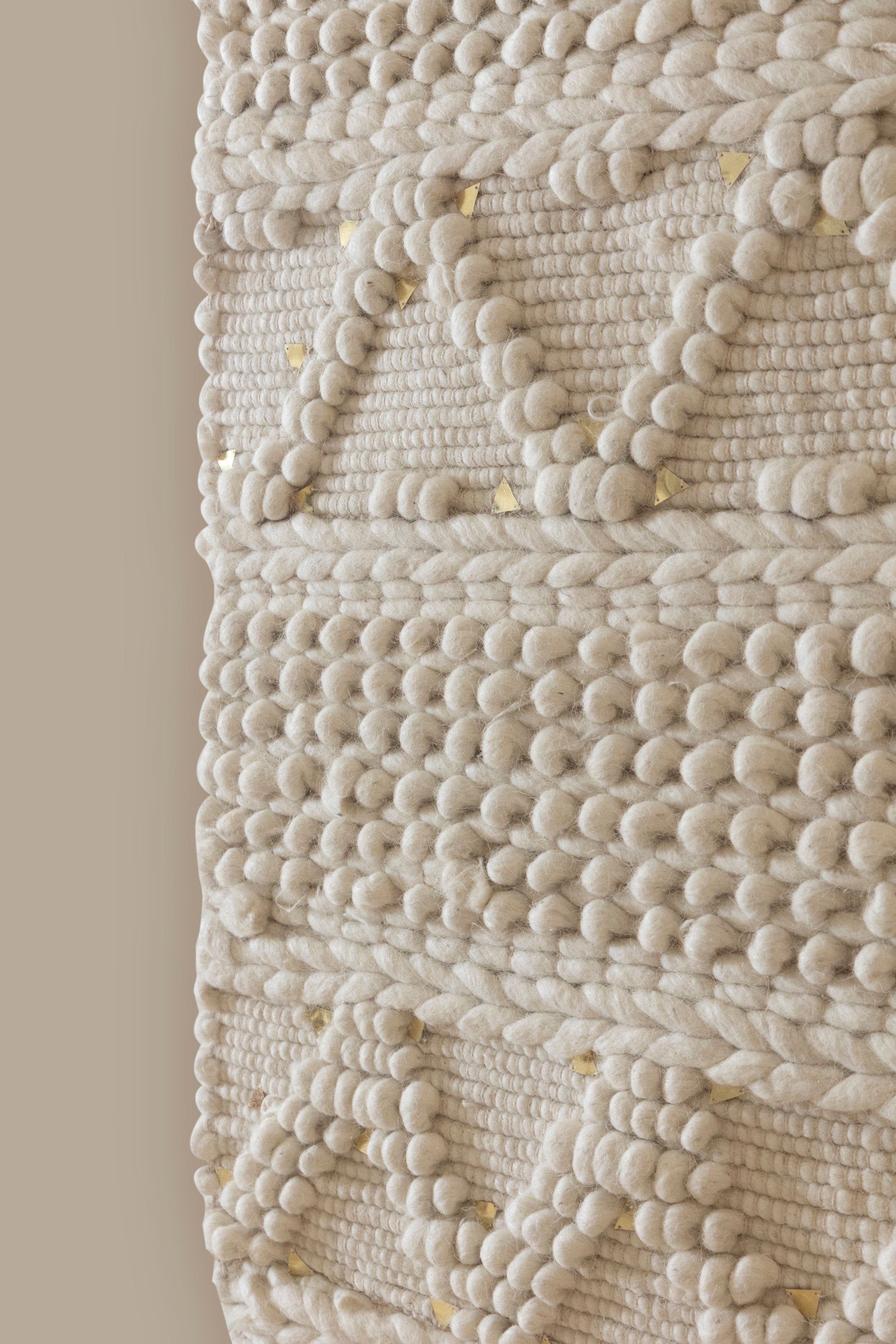Boho-chic macrame wall hanging with geometric patterns and soft fringe for modern home decor