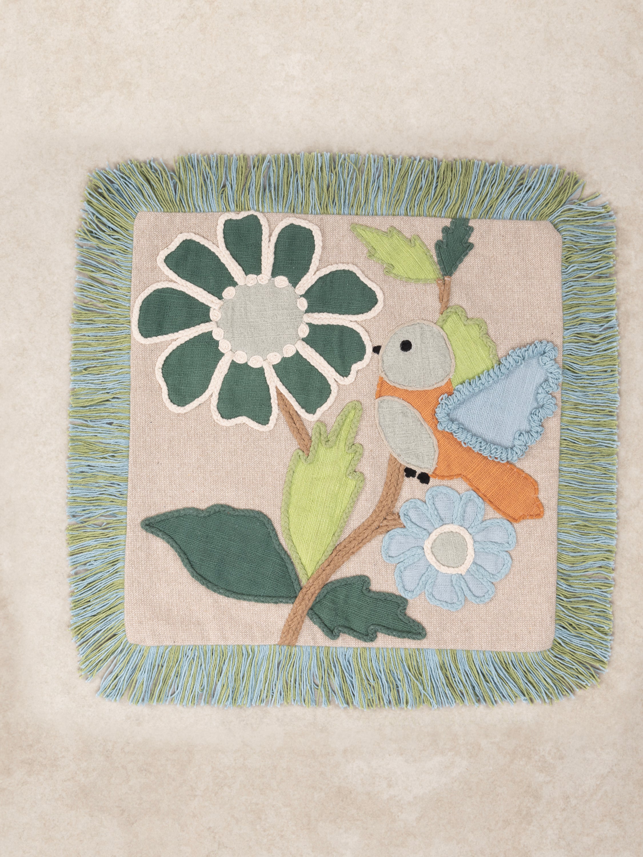 Hand-Stitched Nature-Themed Throw Pillow with Bird & Flowers – A unique decorative pillow showcasing an intricately embroidered bird perched on a floral branch with colorful appliqué details