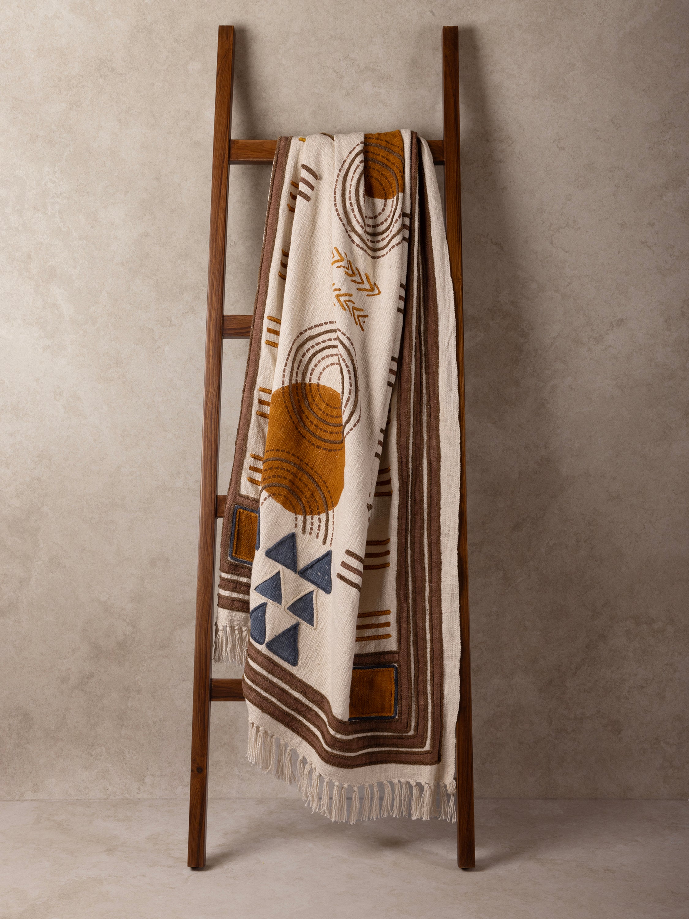 Handcrafted Abstract Throw Blanket with Modern Tribal Design – A lightweight decorative textile with geometric shapes, sun motifs, and intricate line details, ideal for a contemporary or bohemian home