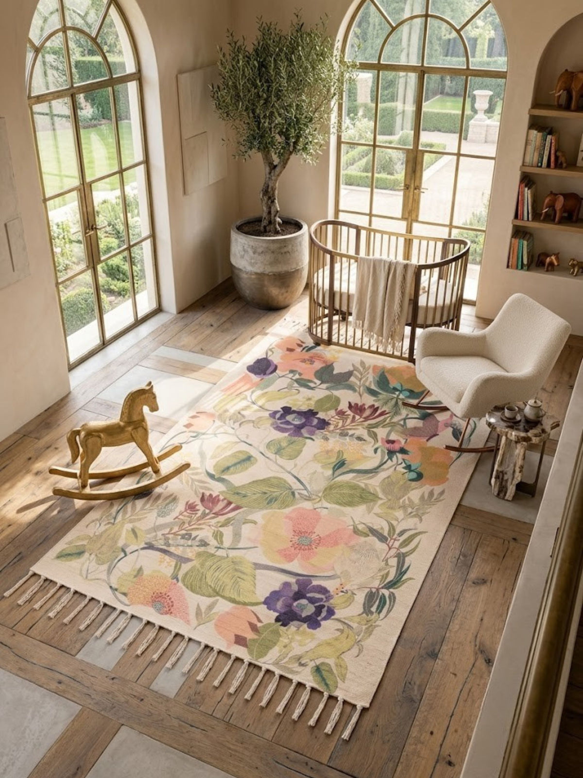 Cotton botanical rug styled in a sunlit room with potted plants.