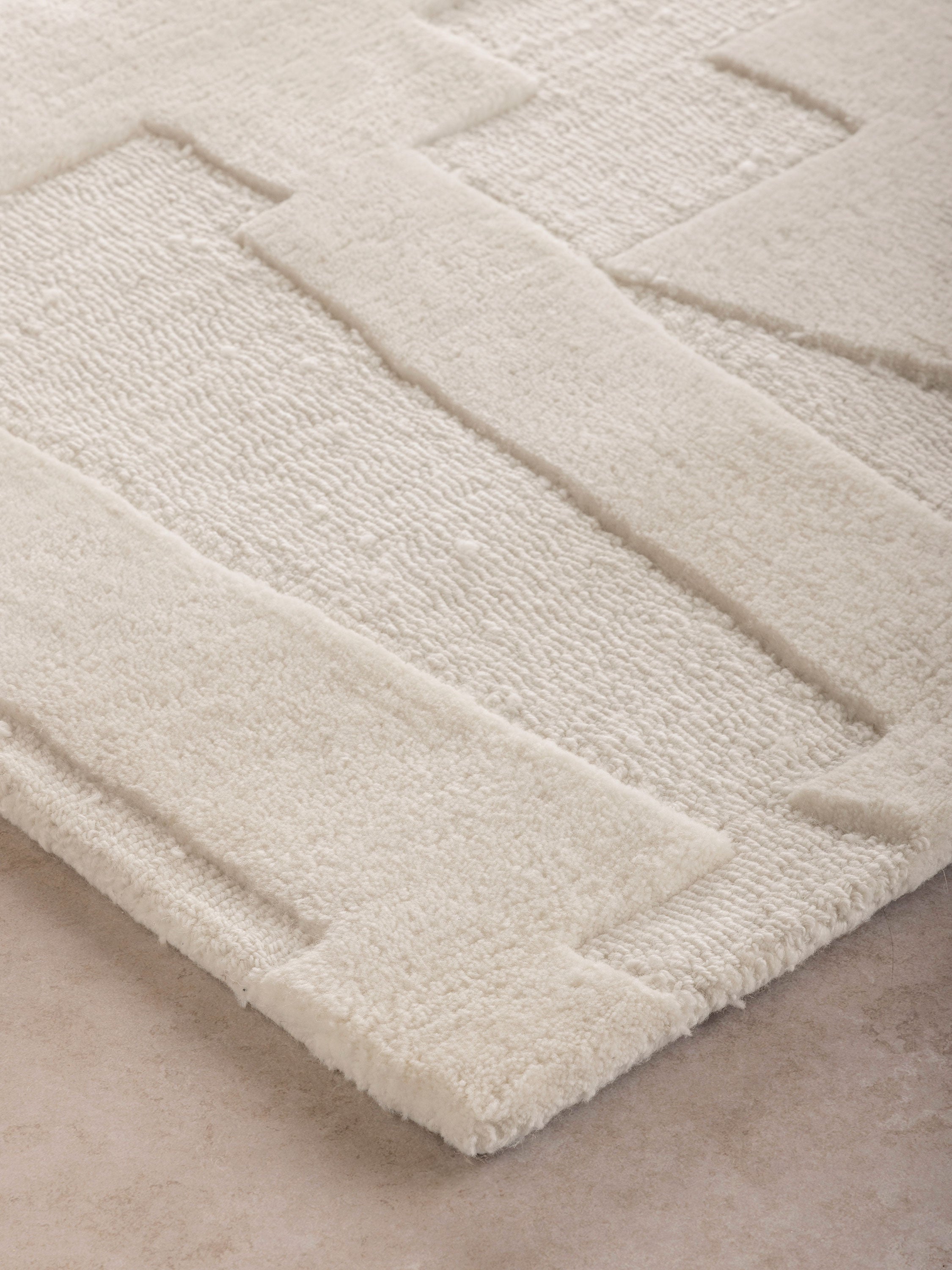 Close-up of High-Low Texture on Ivory Designer Rug by GAURI KOHLI