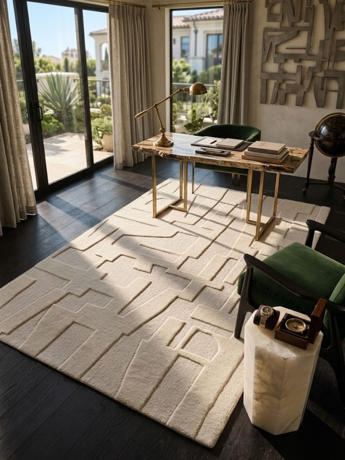 Ivory wool and cotton rug with an architectural sculpted pattern, styled in a home office.