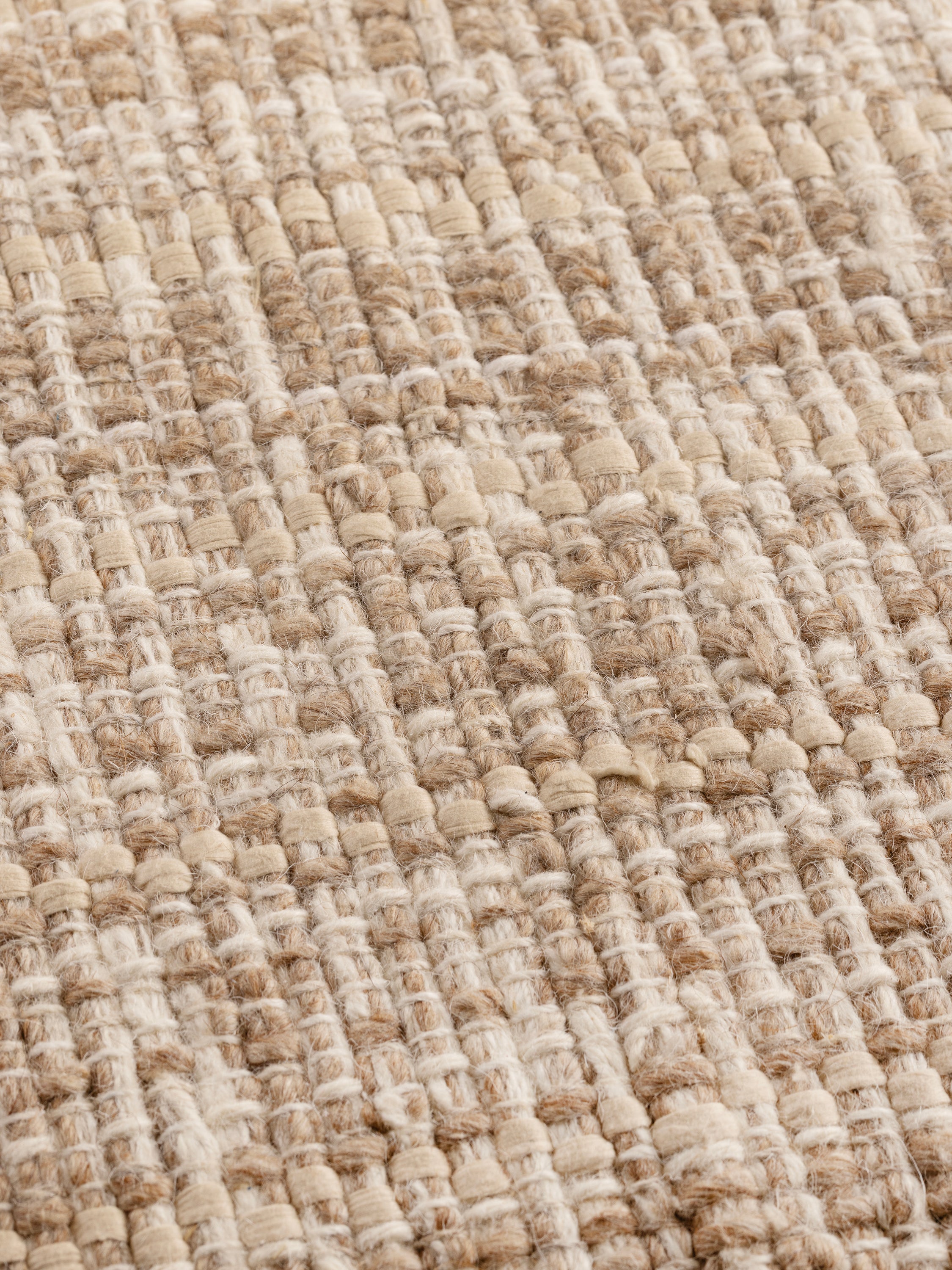 Close-up texture view of the Phoenix rug highlighting premium wool-cotton fibers and artisan weave
