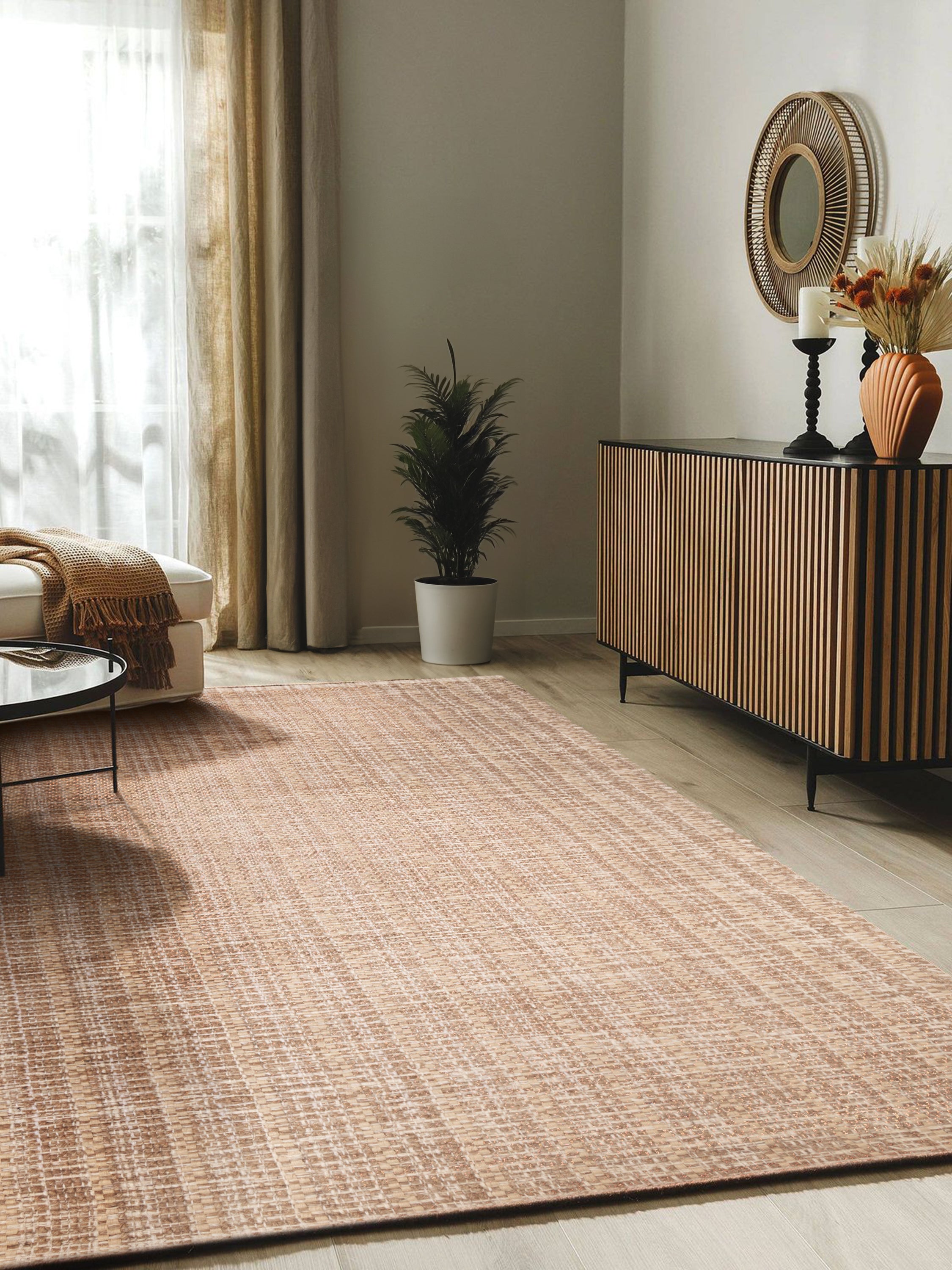 Phoenix rug in a modern living room setting, emphasizing its warm neutral palette and handcrafted character