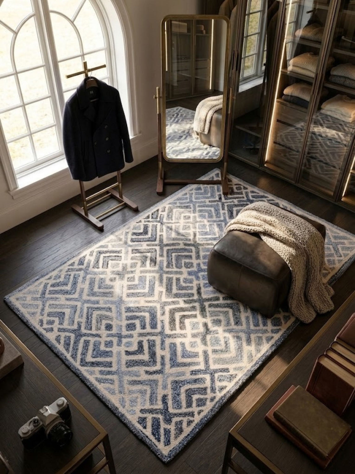 Wool and denim rug with a close-set pile, styled in a room with warm lighting.