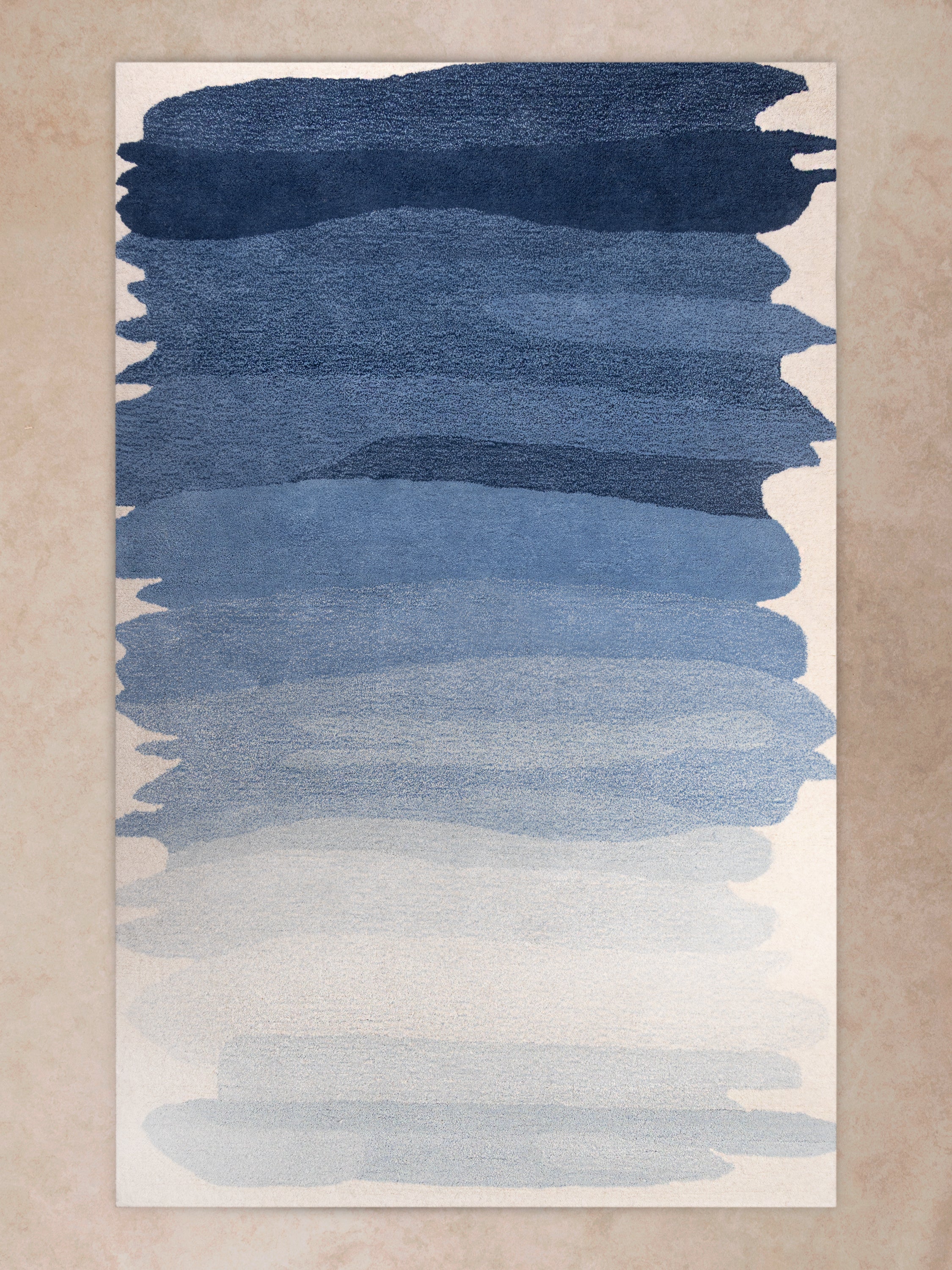 Antigua rug with ocean blue gradient bands hand-tufted in premium wool and medium pile