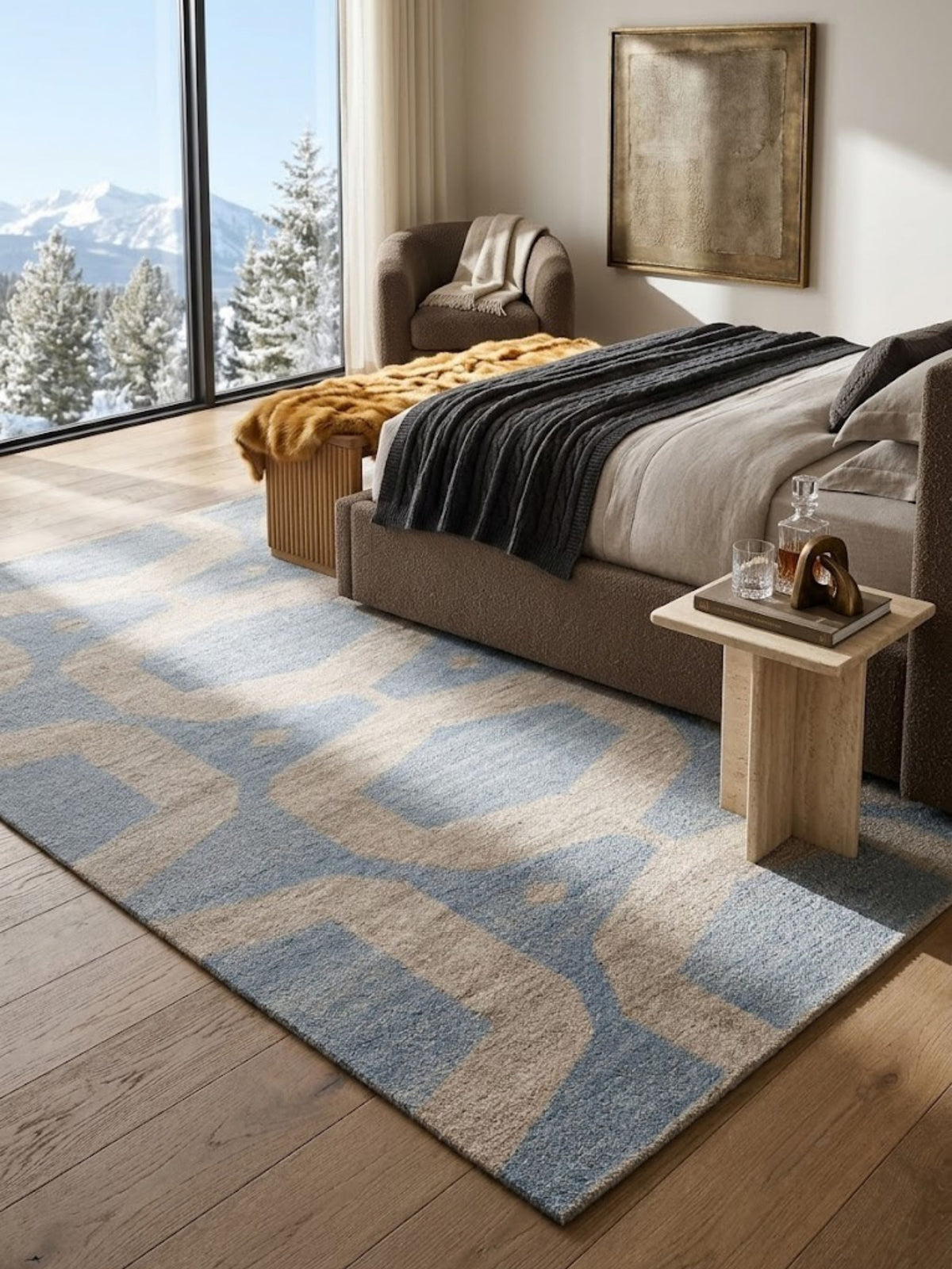 Flatwoven wool rug with a clean blue and sand color contrast, styled in a bedroom.
