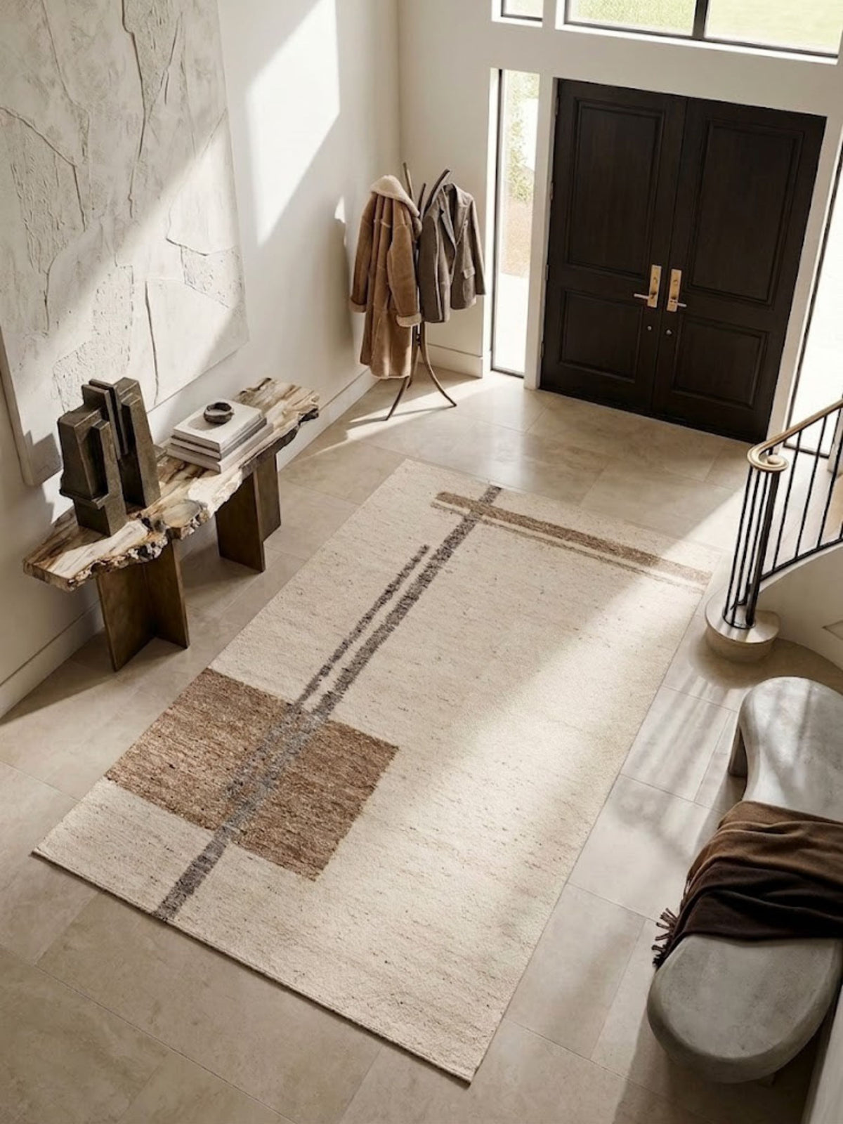 Wool rug with a tonal block pattern, its caramel block grounding one corner of the room.