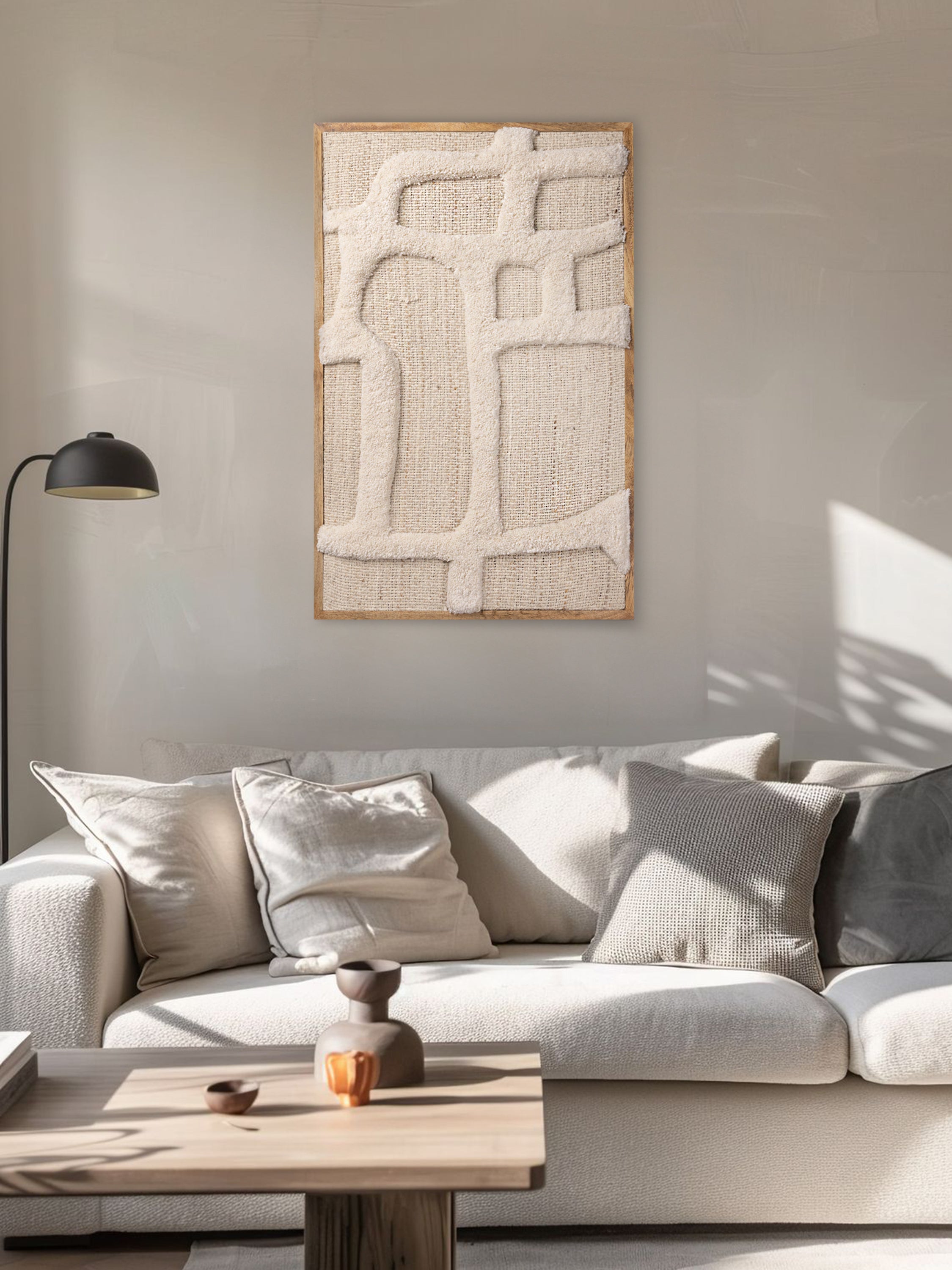 Lofoten hand woven wall art styled in a serene modern living room