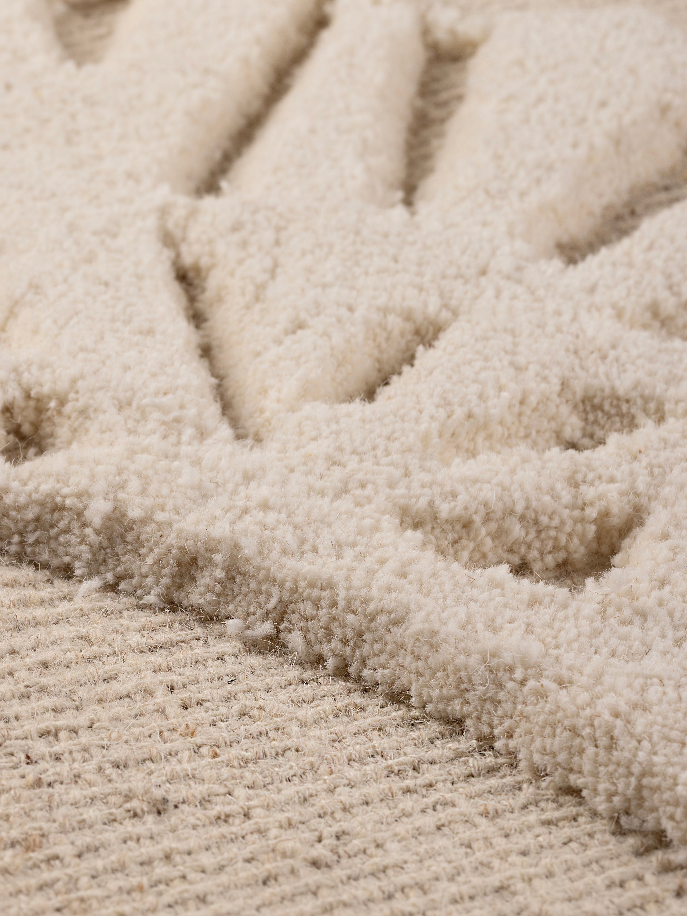 plush wool tufting detail on Monarch wall art surface