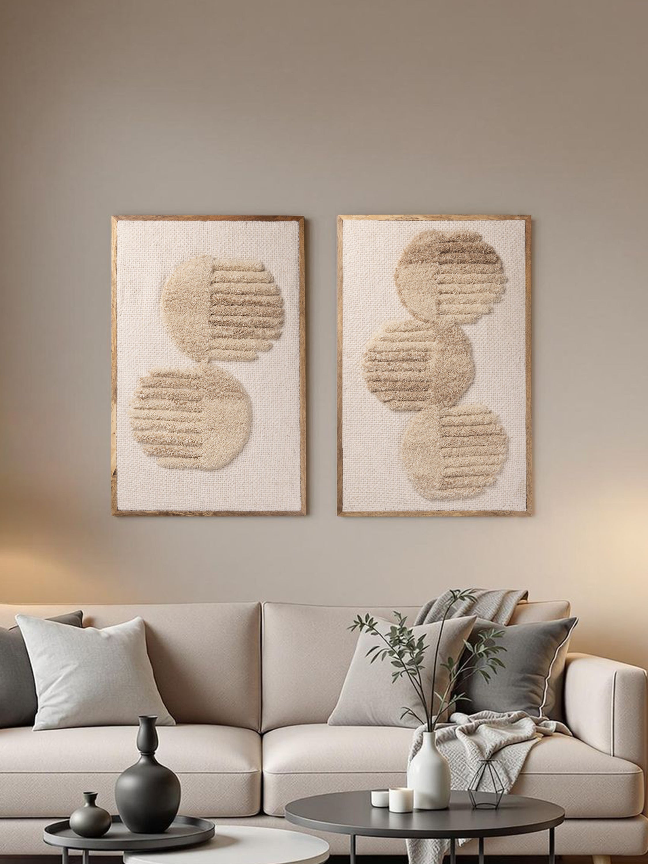 two handcrafted wool wall art pieces styled in a calm minimalist space