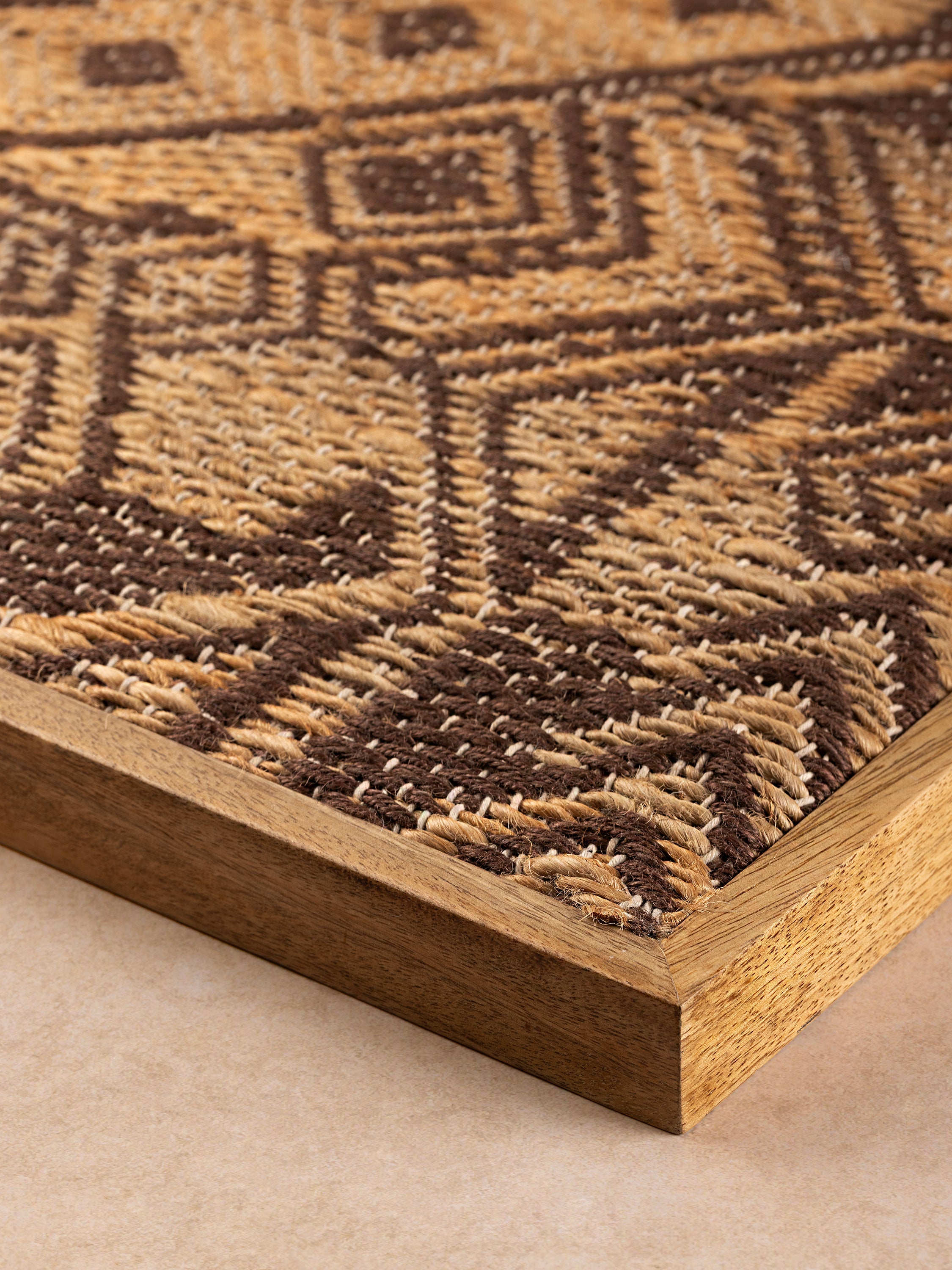 corner frame detail highlighting artisan construction and natural fibers