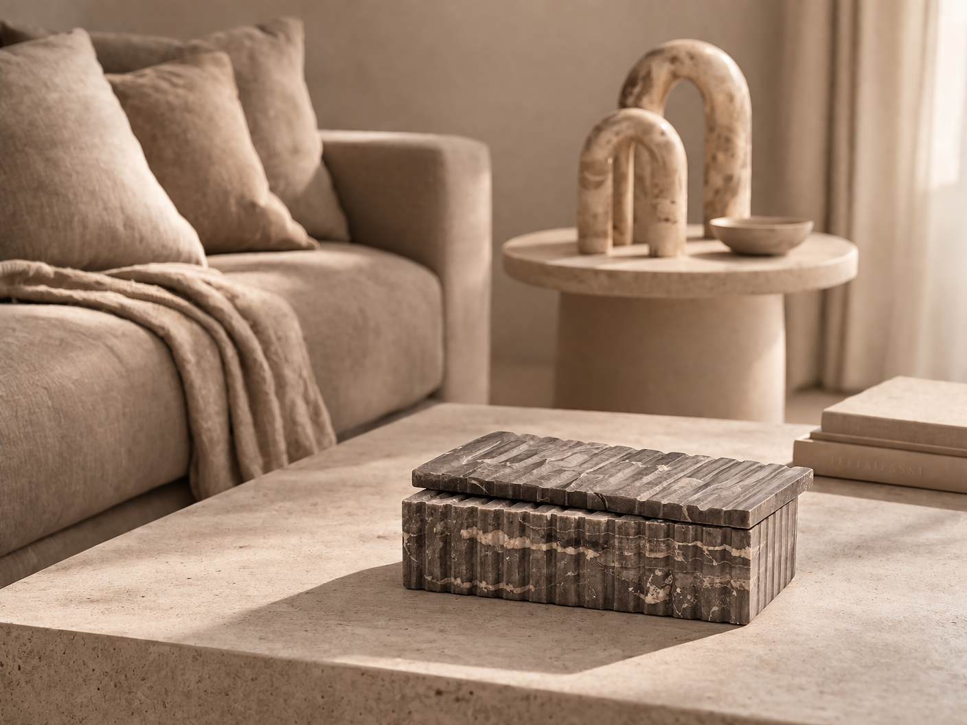 Luxury marble box styled in a serene living space with soft beige tones and layered textures