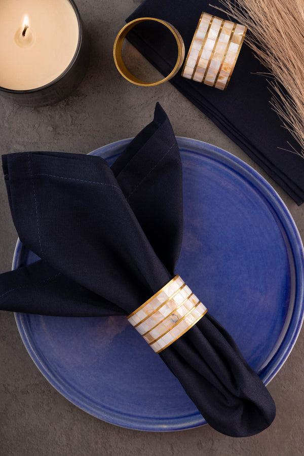 white and gold napkin rings