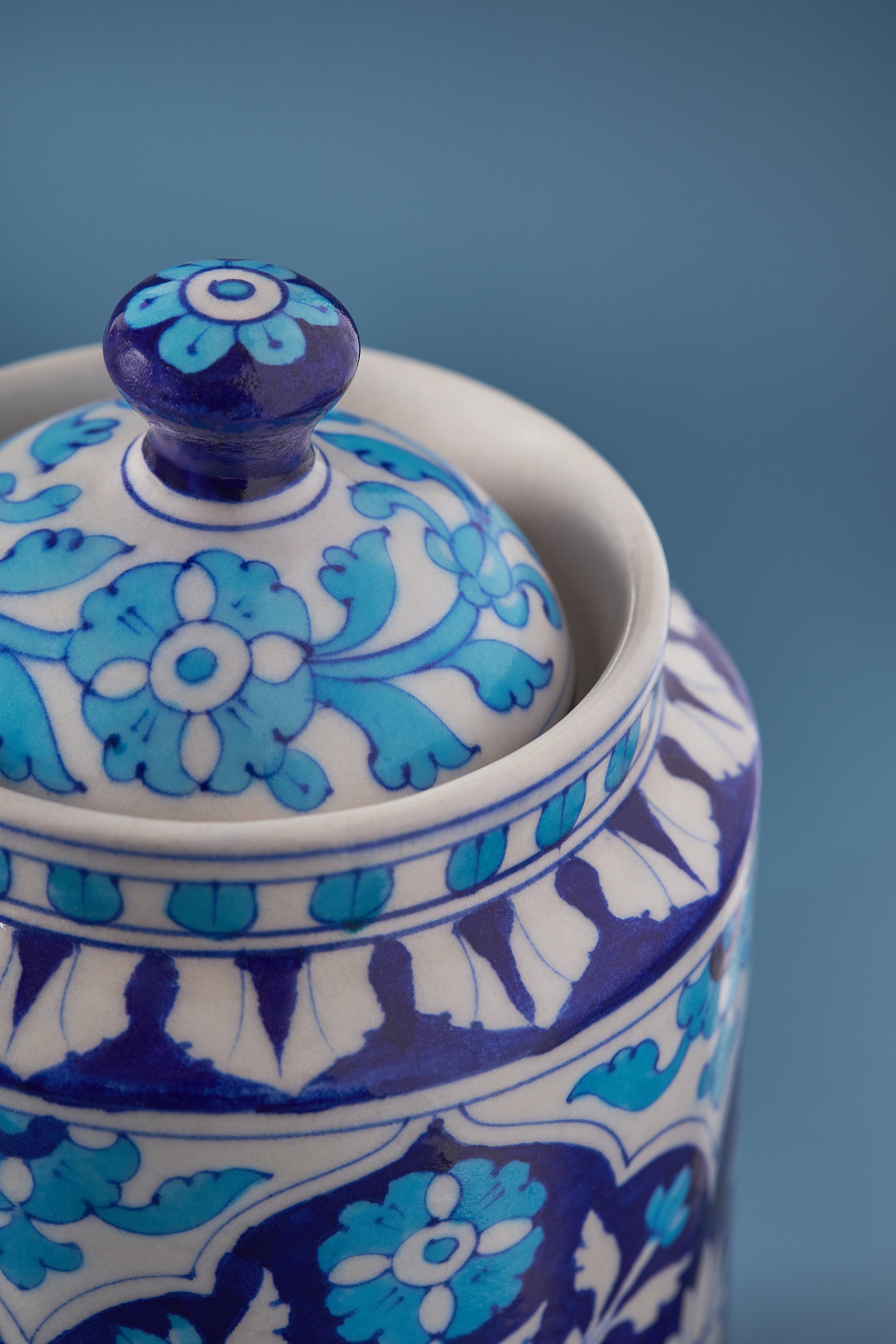 Luxury Blue Ceramic Canister – Functional and Stylish
A vibrant, handcrafted pottery canister with an intricate floral design, ideal for kitchen organization or as a decor piece