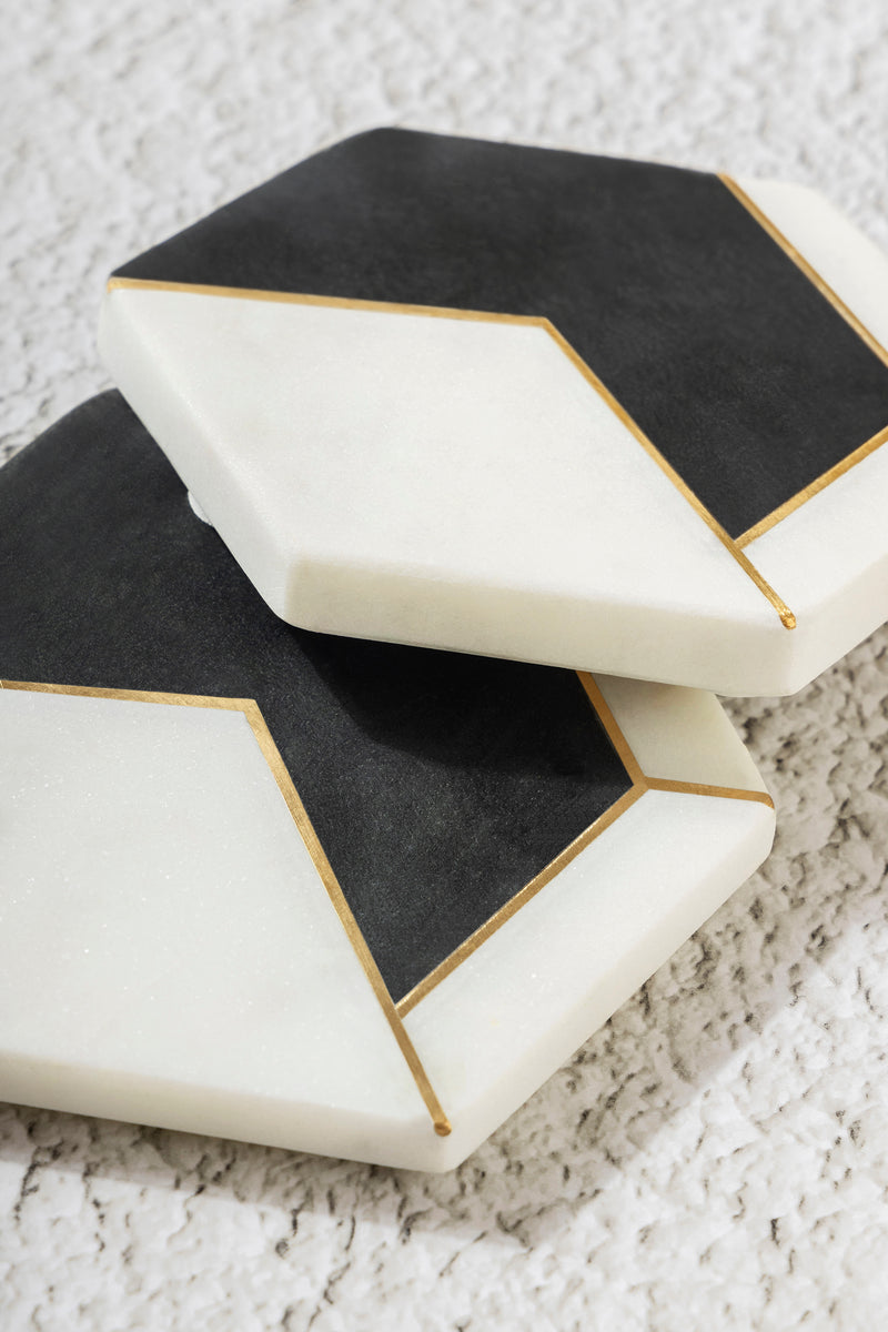 white marble coasters with gold trim