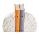 white and gold book ends